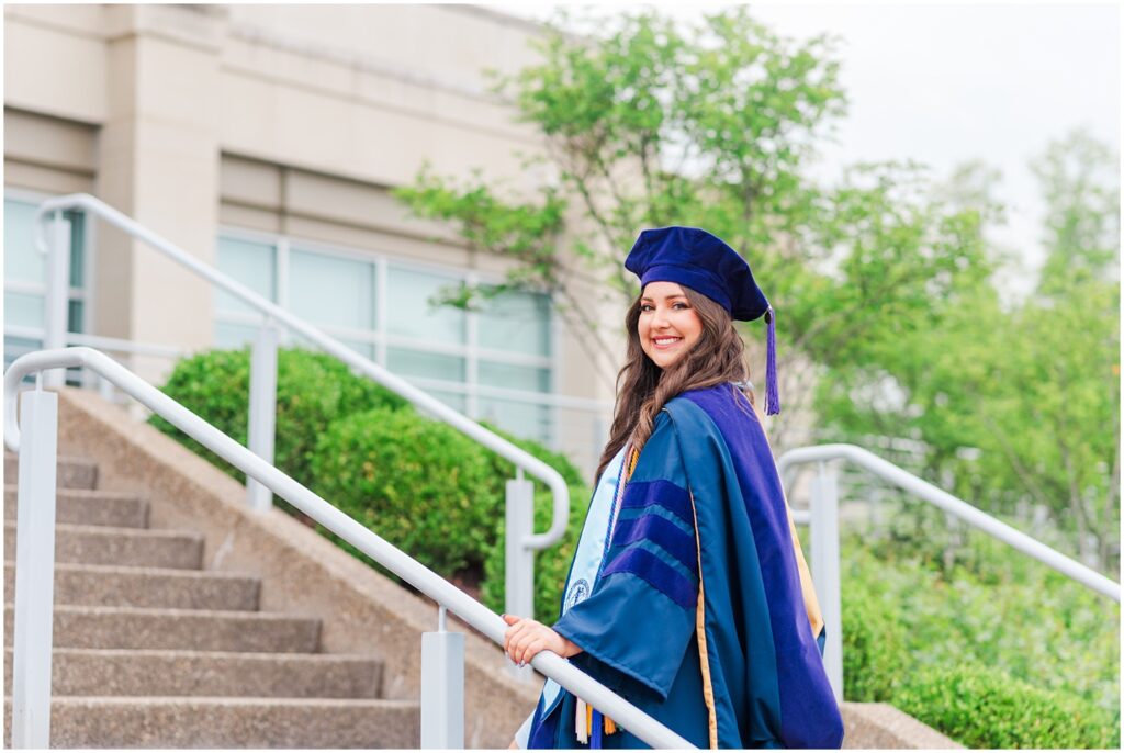 West Virginia University law school student walking up the stairs for graduate session