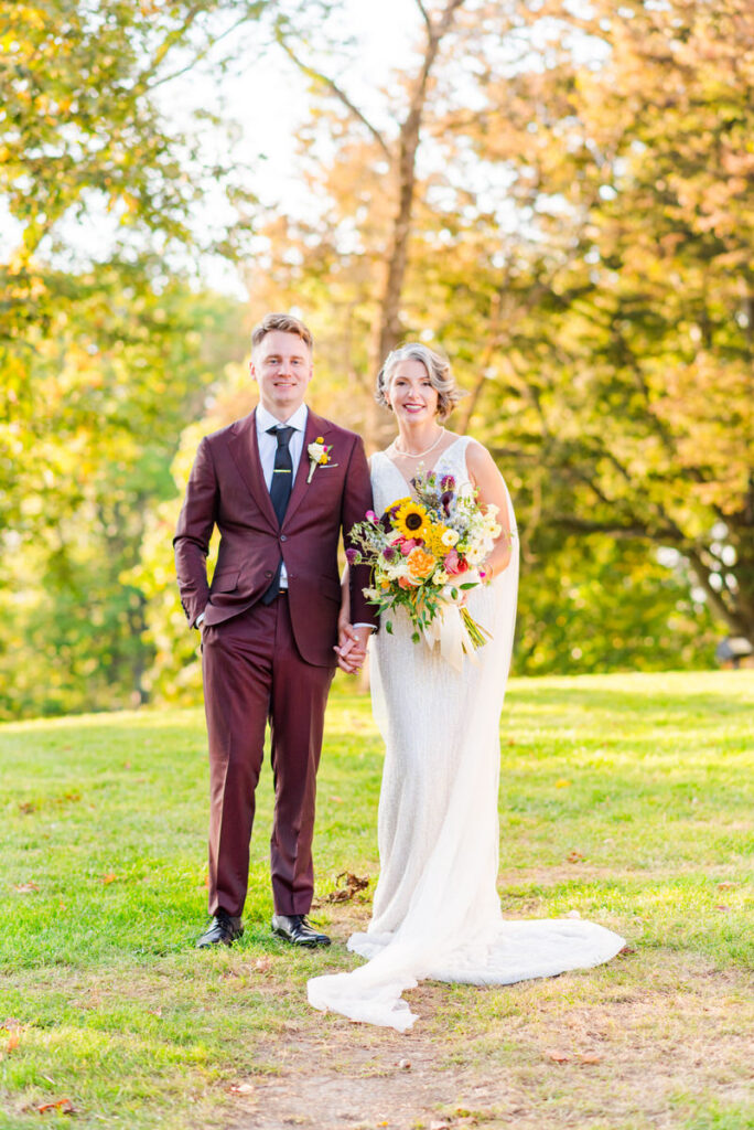 bride and groom posing for wedding portrait
