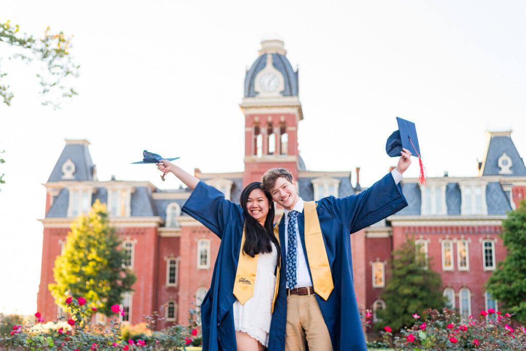 couple posing in front of woodburn hall